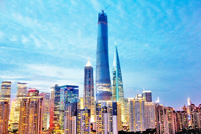 Bộ 3 toà tháp - trung tâm tài chính của Trung Quốc: tháp Kim Mậu (trái), tháp Thượng Hải và Trung tâm Tài chính Thượng Hải. Ảnh: Inhabitat.