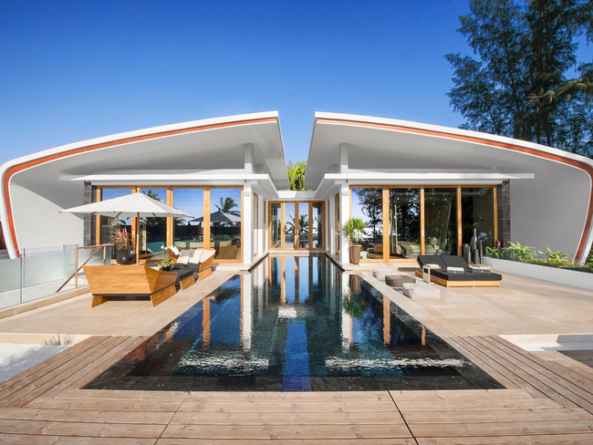 Iniala Beach House (Phuket, Thái Lan): Các thiết kế mang hơi hướng tương lai của khu nghỉ mát Iniala Beach House là lý do thu hút du khách trên khắp thế giới. Du khách đến đây có thể thuê biệt thự và căn hộ penthouse, có một quản gia phục vụ, lái xe, đầu bếp, chuyên gia trị liệu spa.