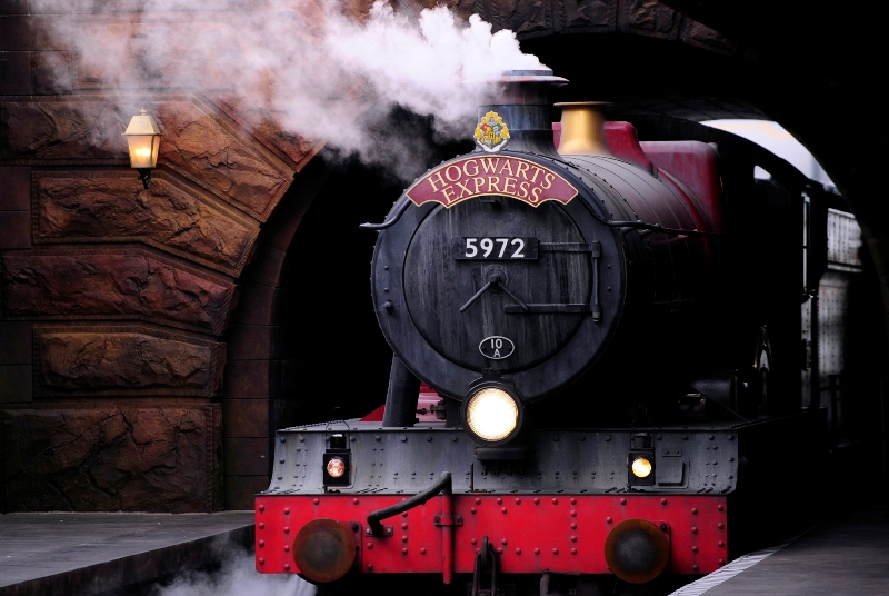 The Hogwarts Express train, which connects the Universal Studios with neighboring Islands of Adventure, pulls into the Hogsmeade Station during a media preview for The Wizarding World of Harry Potter-Diagon Alley at the Universal Orlando Resort in Orlando, Florida June 19, 2014. The new attraction, which opens to the public on July 8, expands the original Harry Potter world, which opened in 2010 and is modeled after Hogsmeade Village, which is located near the Hogwarts School of Witchcraft and Wizardry where the series' leading character Harry Potter begins his magical adventures. REUTERS/David Manning (UNITED STATES - Tags: ENTERTAINMENT BUSINESS SOCIETY)